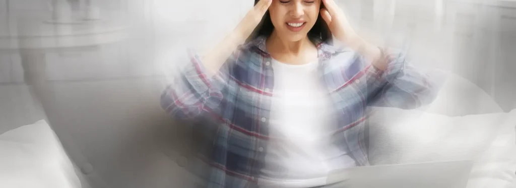 Young woman suffering from alcohol poisoning.