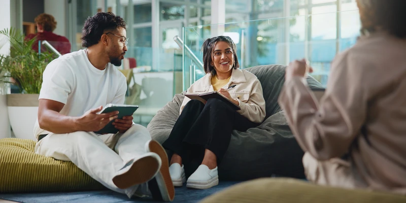 liberty group therapy man woman sitting couch office