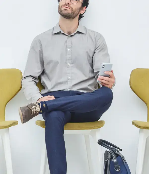 liberty internet addiction man sitting chair cell