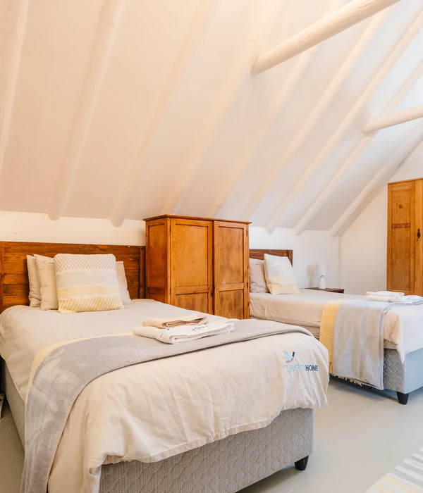 liberty two beds room white walls client