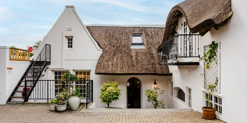 liberty white house thatched roof client