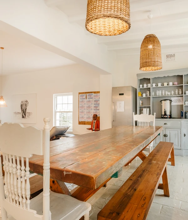 liberty wooden table sitting light fixture client