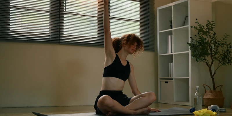 liberty yoga woman black bikini top shorts doing