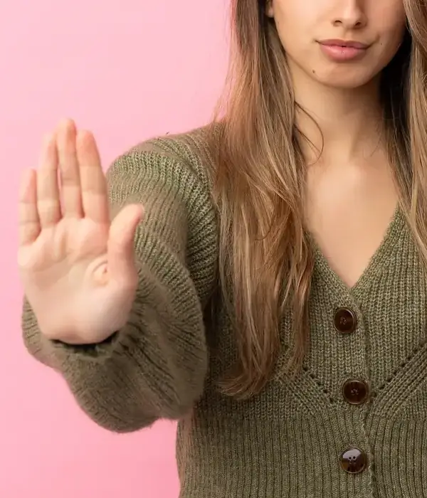 liberty-alcohol-detox-woman-green-sweater-making-stop-gesture-page