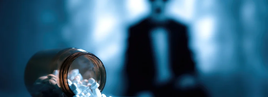 Pills spilling from a bottle, representing Xanax use and detection in the body