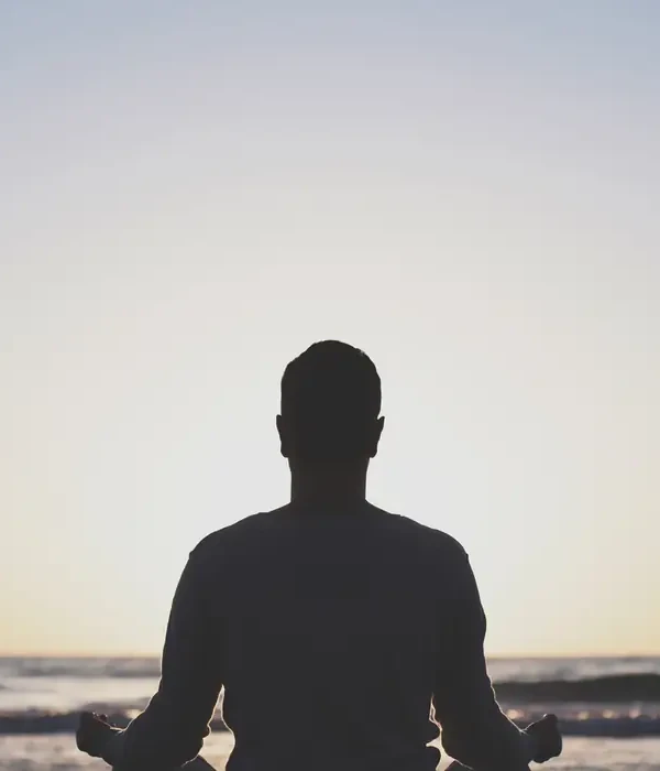 liberty-environment-man-meditating-beach-sunset-enviroment-page