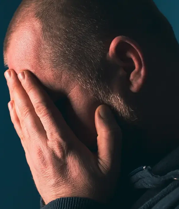 liberty-mental-health-man-hands-face-page.webp