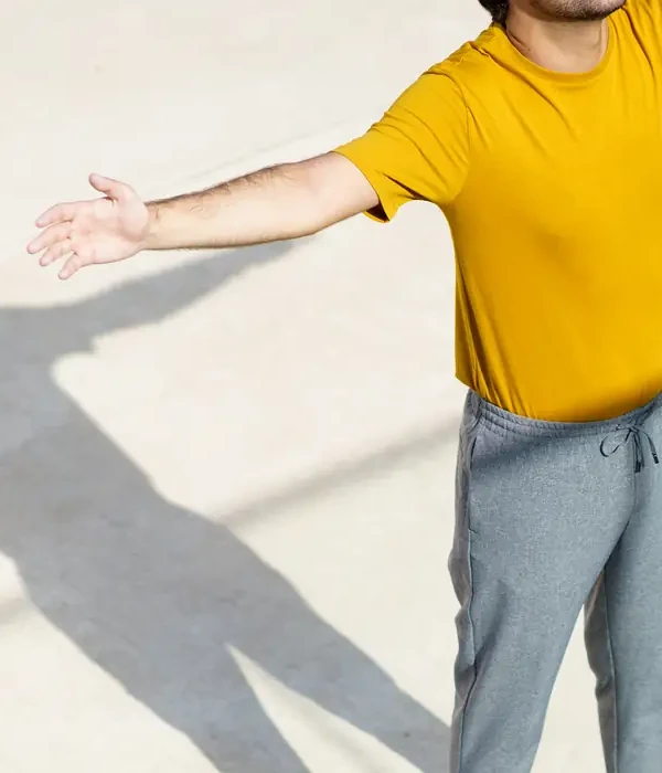liberty-environment-man-yellow-shirt-grey-pants-enviroment-page