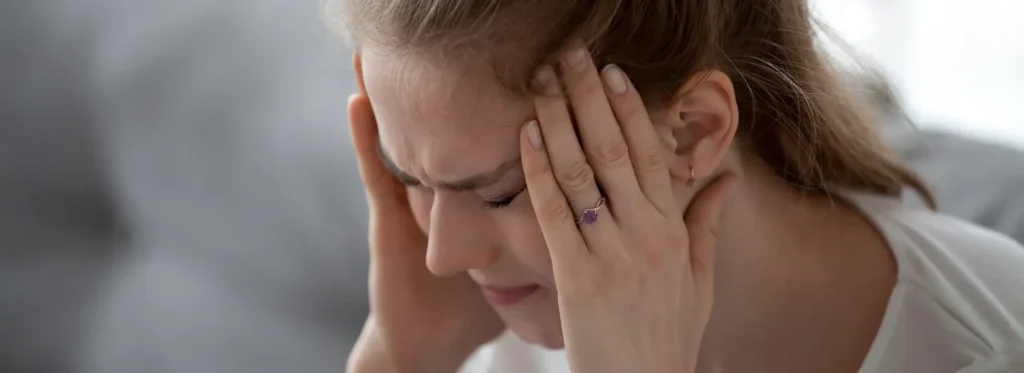 Woman struggling with alcohol poisoning.